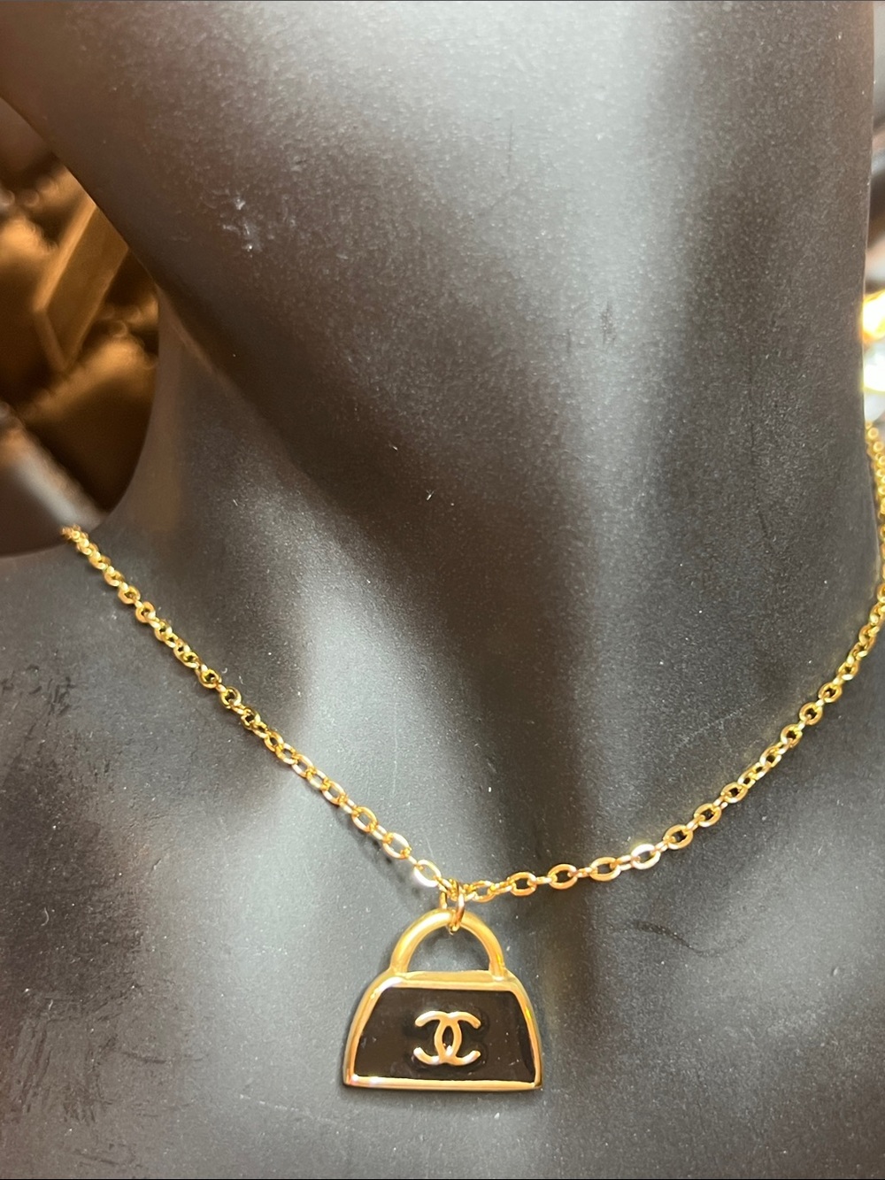 Gold-tone Necklace with Black Handbag Pendant